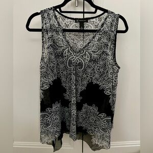 Very pretty 2 pc sleeveless tank w/black attached camisole underneath